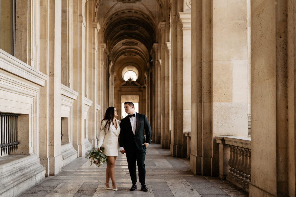 Paris Elopement Packages Elopement Photographer Videographer Louvre hallway couple