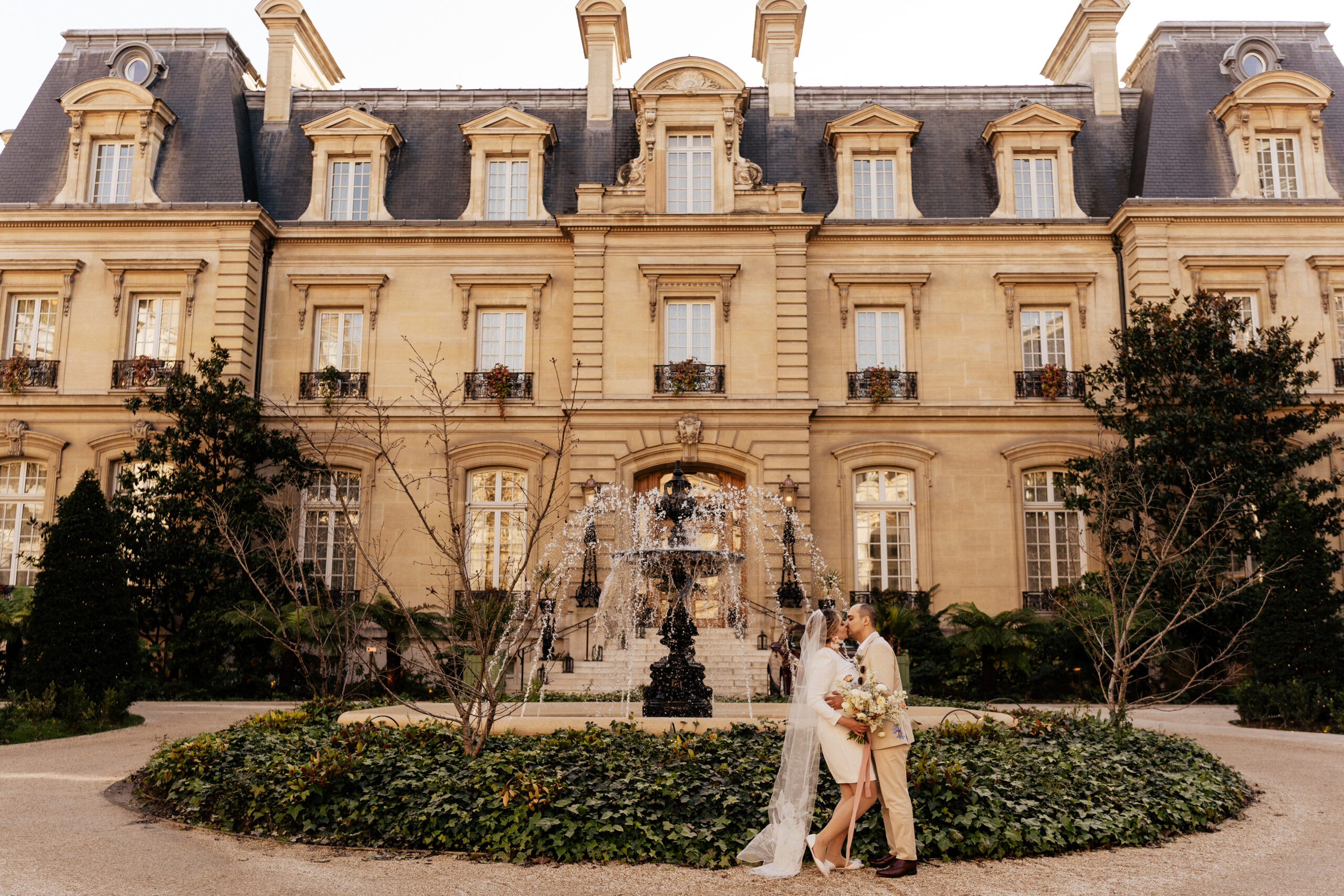 Paris Elopement Packages Elopement Photographer Videographer winter elopement couple at Saint James Paris garden 