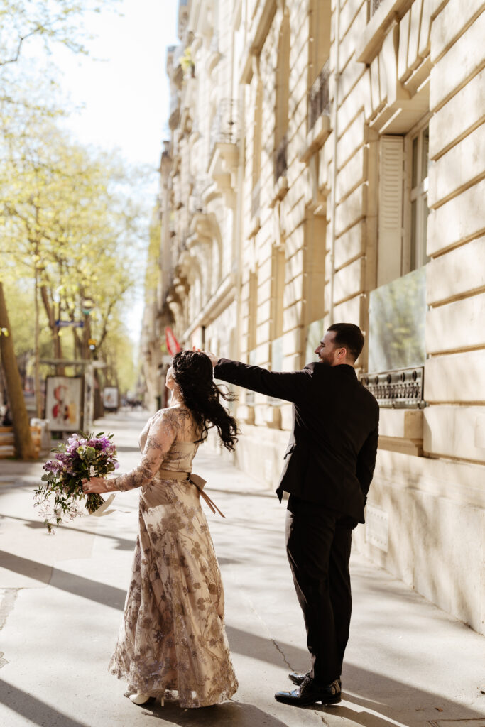 Destination Purple wedding elopement in Paris couple dancing 