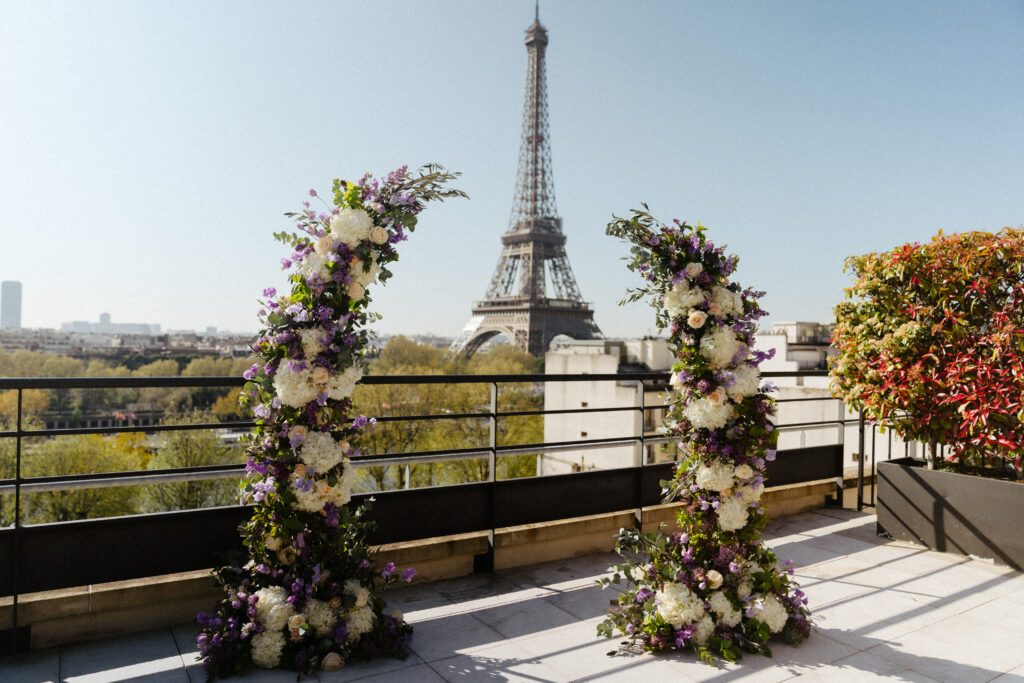 Destination Purple wedding elopement at Shangri-La Hotel Paris private rooftop Eiffel Tower view floral arch 